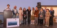 Seonaid McArthur, who led the Coastal Historic District initiative, with Ann Dynes, Alexandra Corsi, Molly McClain, Brenda Fake, Shannon Smith, Bob Evans, Diane Kane, Patrick Ahern, Phyllis Minick, Courtney Coyle