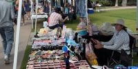 Selling cheap sunglasses, like Kobies Swap Meet