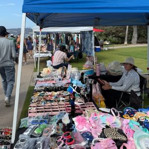 Selling cheap sunglasses, like Kobies Swap Meet